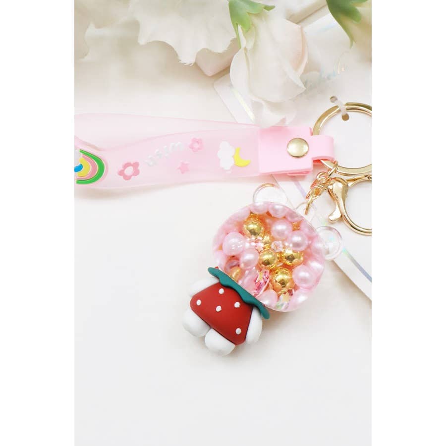 PINK Floating Pearl and Glitter Kitty Key Chain for wholesale on Faire2