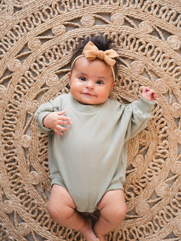 Oversized Cozy Romper - Sage for wholesale by Addie Joy company