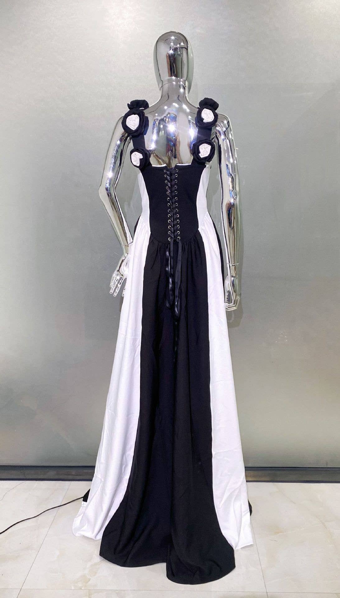 DR411 Deep V Black & White Striped Dress with Floral Accents for wholesale on Faire5