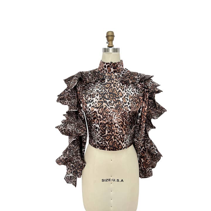 Blouse léopard à volants  pour la vente par XHHH Inc