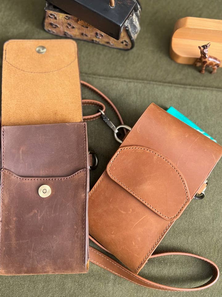 Vintage leather phone bag mini crossbody for wholesale by Roma Leathers, Inc.