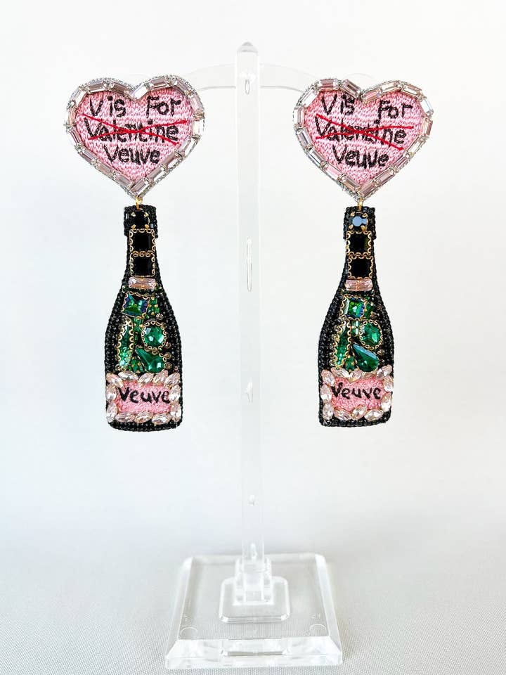 Boucles d'oreilles V is For Veuve pour la vente par Dos Femmes