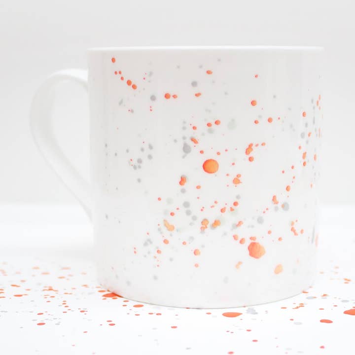 Orange splatter ben Kina mugg för wholesale av Rolfe and Wills