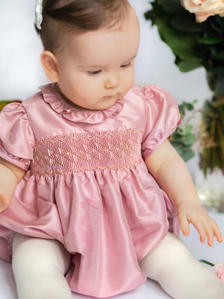 Astrid Pink Silk Smocked Baby Bubble for wholesale by Antoinette Paris