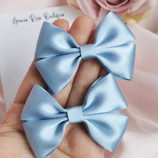 Light blue satin hair bows set of 2 for pigtails for wholesale by Gracie Rose Bowtique