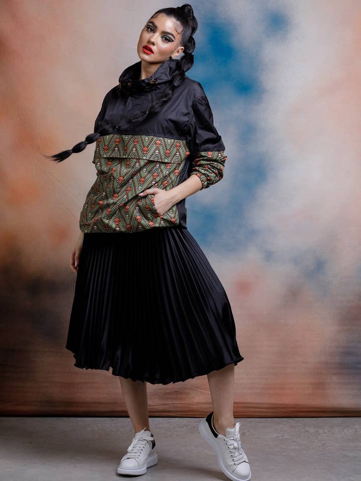 GESCHLECHTSLOSER REGENMANTEL für den Großhandel von MUHIRE SRL