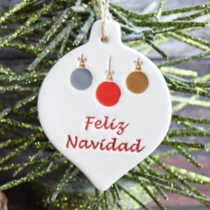 Christmas - Feliz Navidad - Handmade ceramic bauble for wholesale by Broadlands Pottery