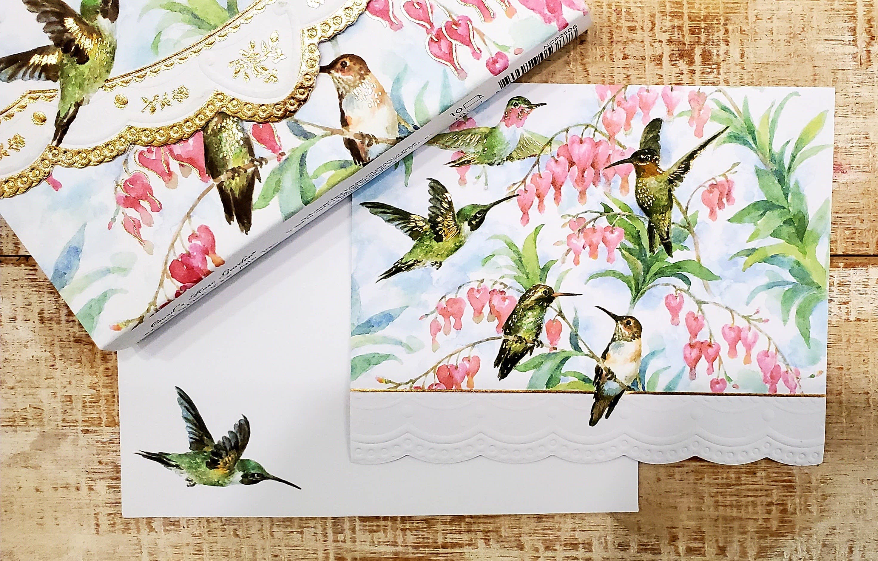 Carol Wilson Fine Arts Inc./For Arts Sake - Wholesale Stationery/Notecard Set - Hummingbird Embossed, Die-Cut Boxed Portfolio Note Card Set NCP25081