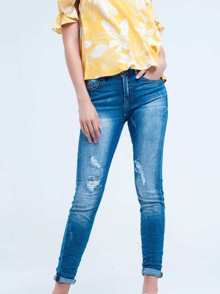 Mid Wash taillierte Jeans mit Rissen für den Großhandel von Q2—All Orders:Free Duties for the US,UK,and Canada