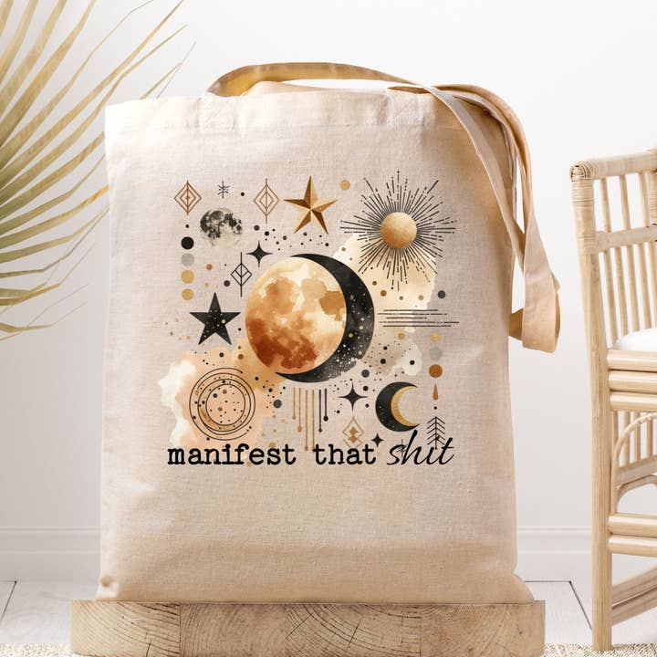 Bolso de lona Manifest That con cita positiva motivacional para venta al por mayor de Dark Horse Dream Designs LLC