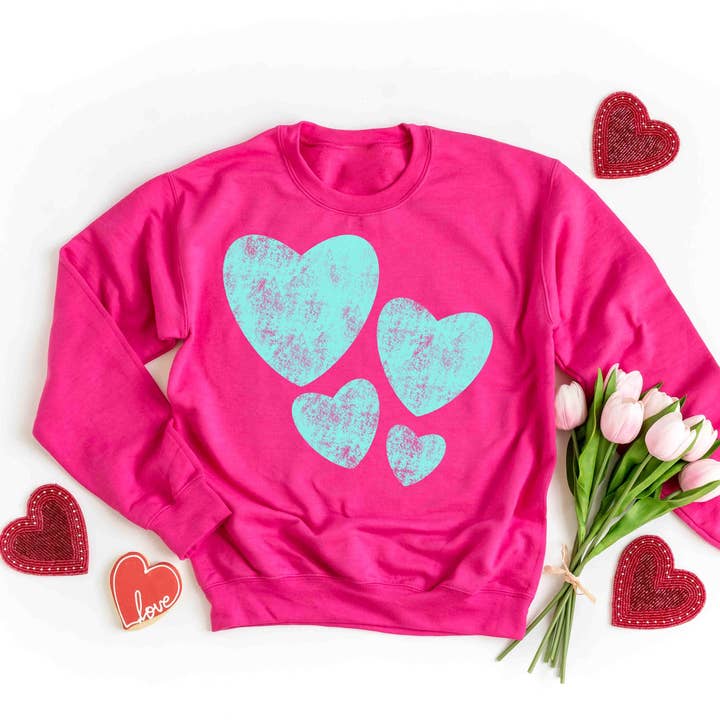 Teal Hearts Crewneck Sweatshirt for wholesale by Great Tees