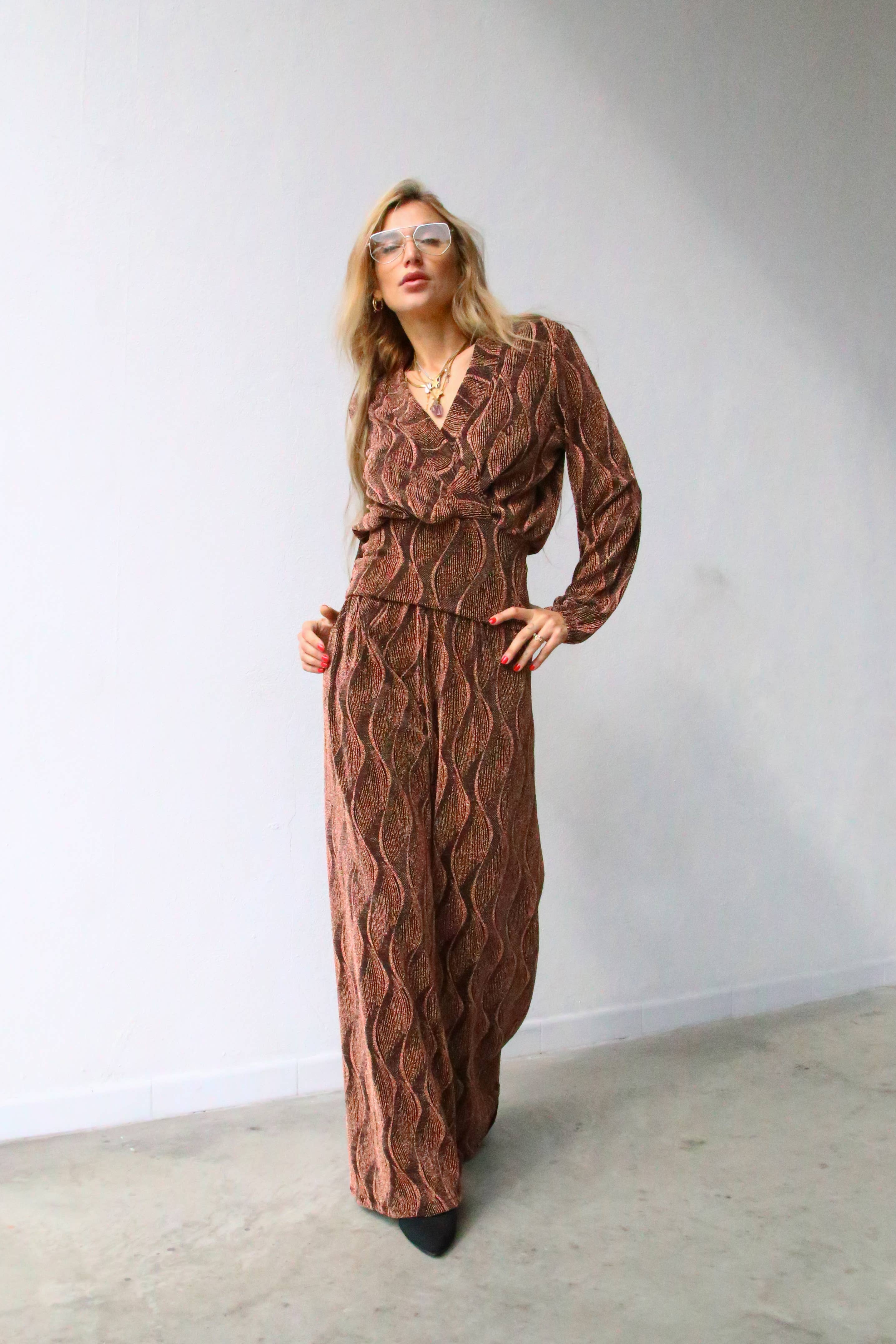 P3052 FLARED LUREX TROUSERS RUST for wholesale on Faire0