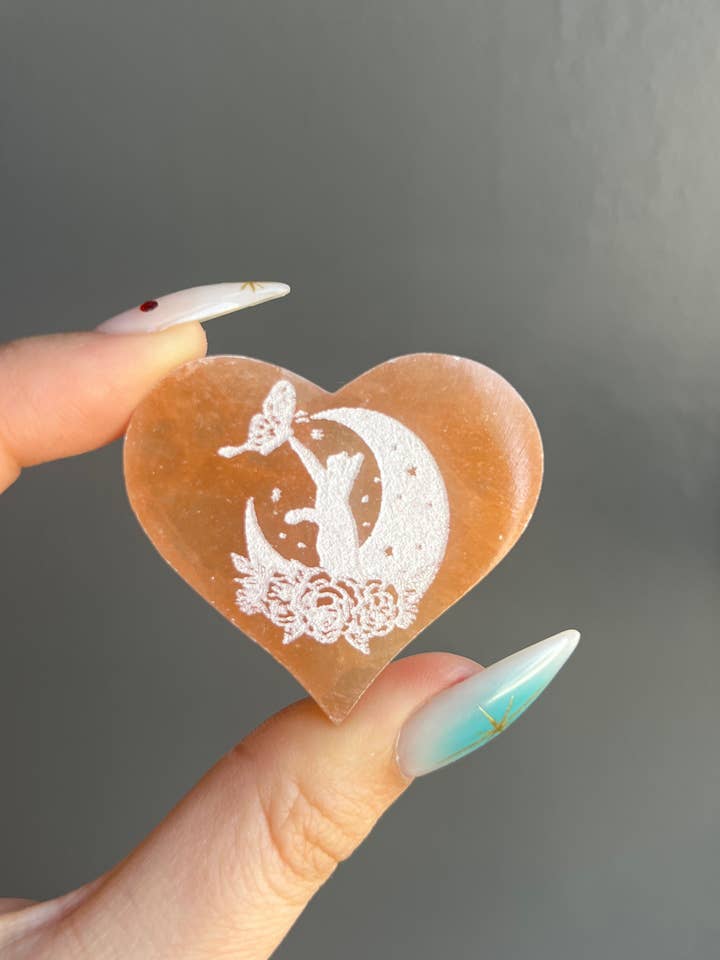 Peach Selenite Etched Cat Crystal Heart Carving for wholesale by Sapphire & Sage