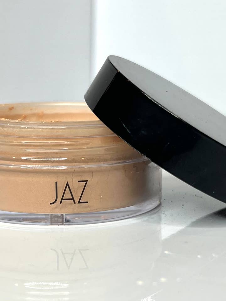 Poudre fixatrice de bronzage pour la vente par JAZ Cosmetics
