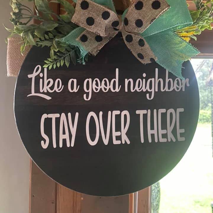 Benz & Co. - Wholesale Door Hanger - Like a Good Neighbor Stay Over There Door Sign Front Porch