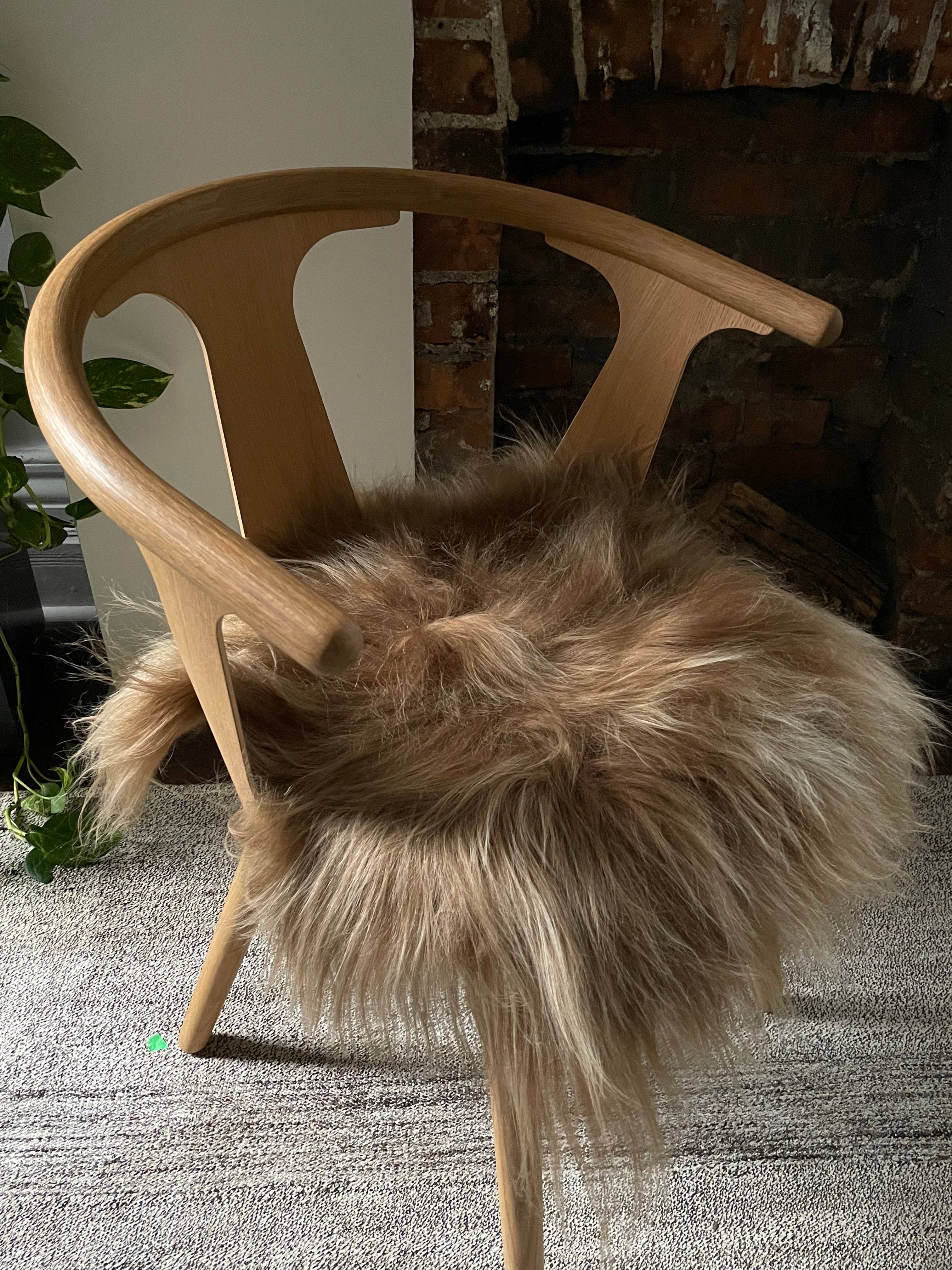 Black Sheep (White Light) - Wholesale Chair Cushion - Brown Icelandic Sheepskin Chair Pad1