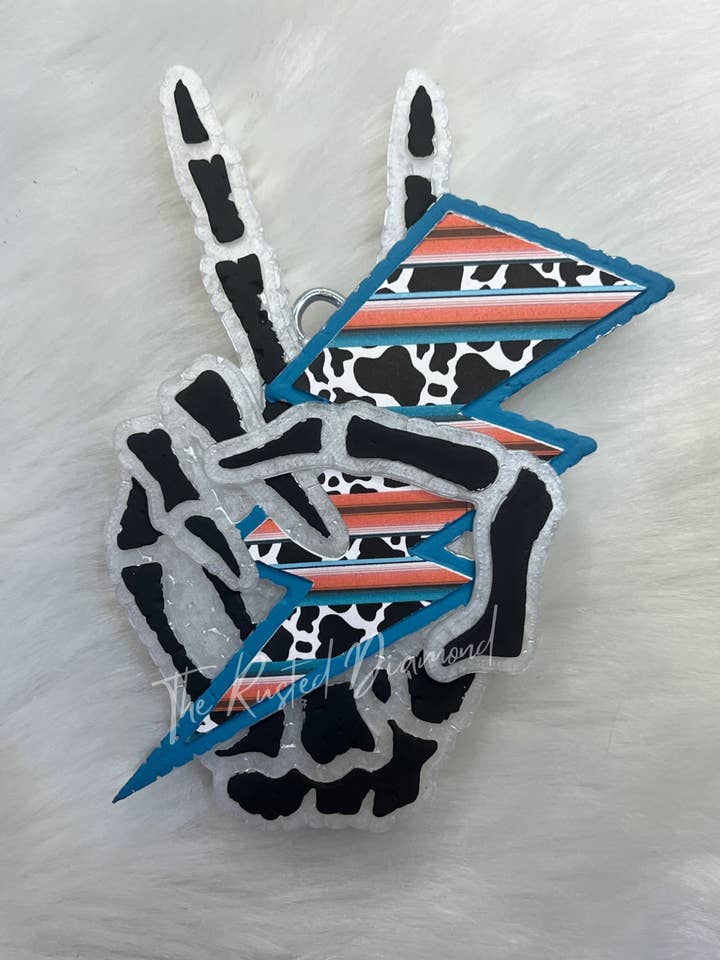 Serape Skelly Hand for wholesale by The Rusted Diamond