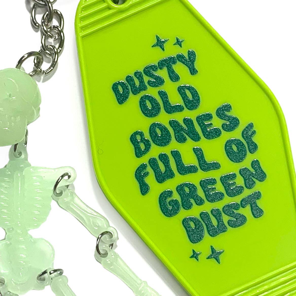 Krystan Saint Cat - Wholesale Keychain - Unisex - Dusty Old Bones Full of Green Dust KOTH Skeleton Keychain1