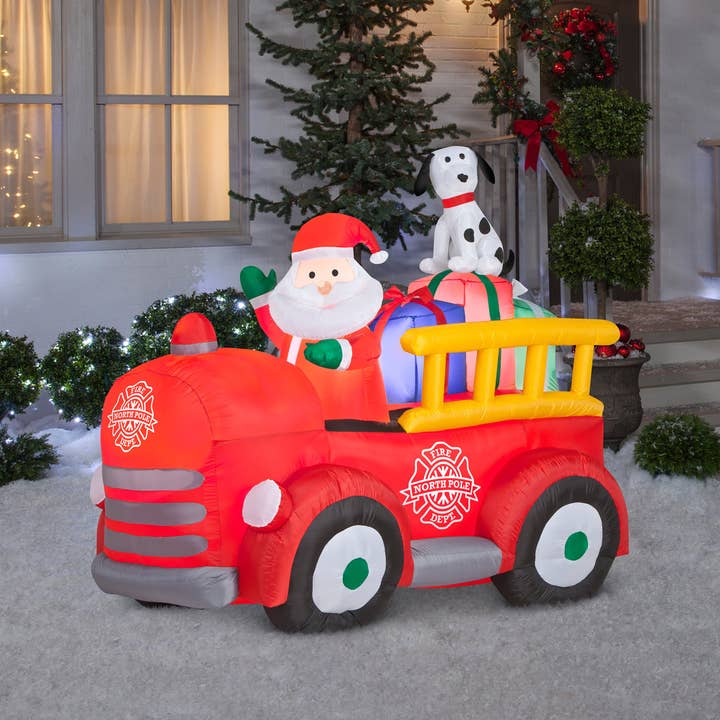 National Tree Company - Wholesale Inflatables - 6 ft. Inflatable Santa in Vintage Firetruck with LED Lights, Plug-In1