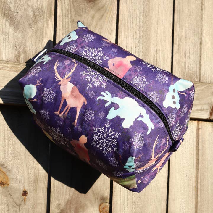 SNOW QUEEN AND FRIENDS TRAVEL POUCH for wholesale by River City Bags