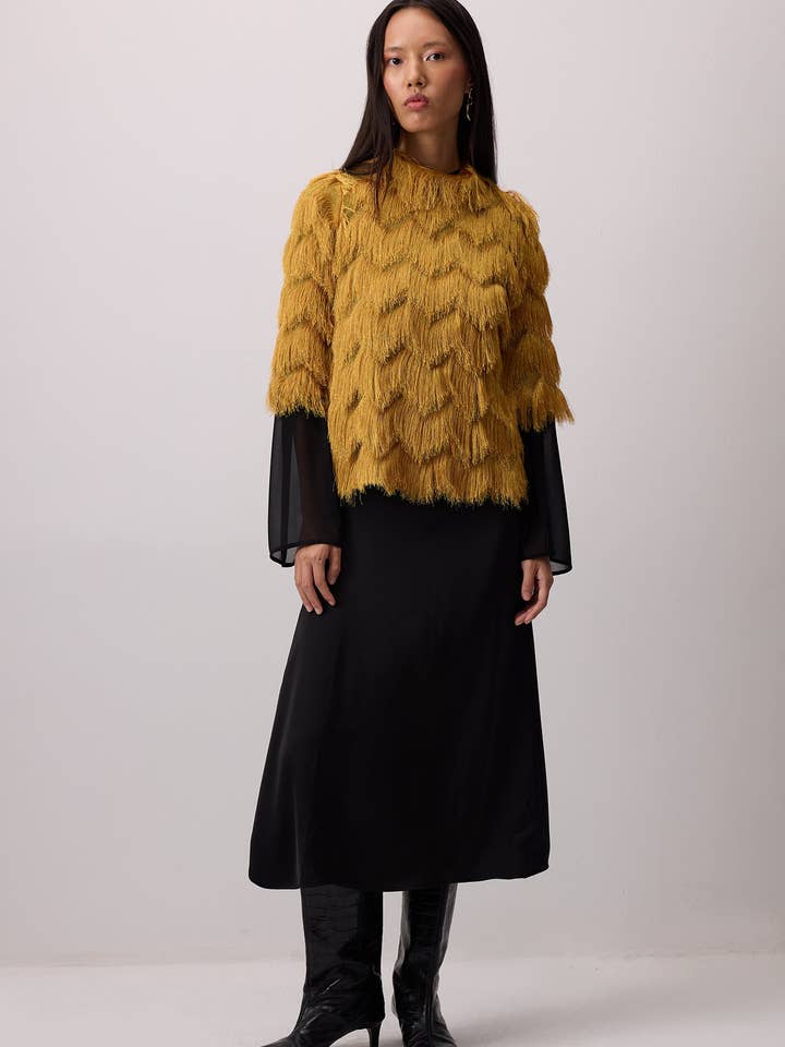 BLOUSE À FRANGES pour la vente par Touché Privé