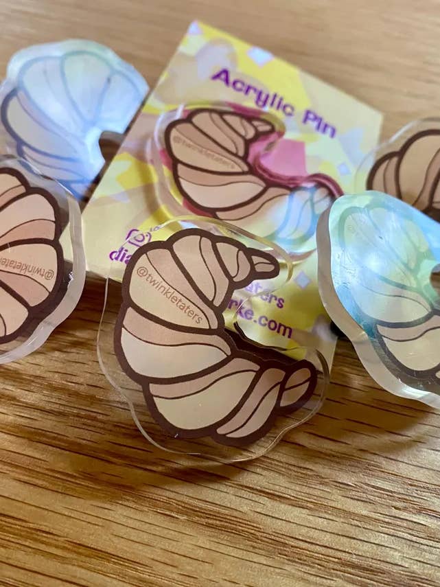 Croissant 1.5" Acrylic Pin for wholesale by Designs by Diana - twinkletaters
