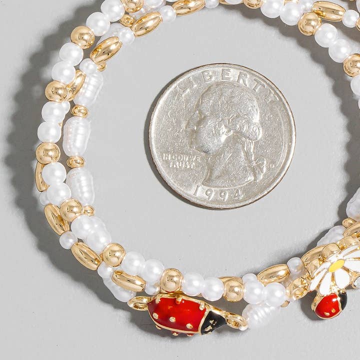 G Enamel Flower And Lady Bug Pearl Beaded Bracelet Set for wholesale on Faire2