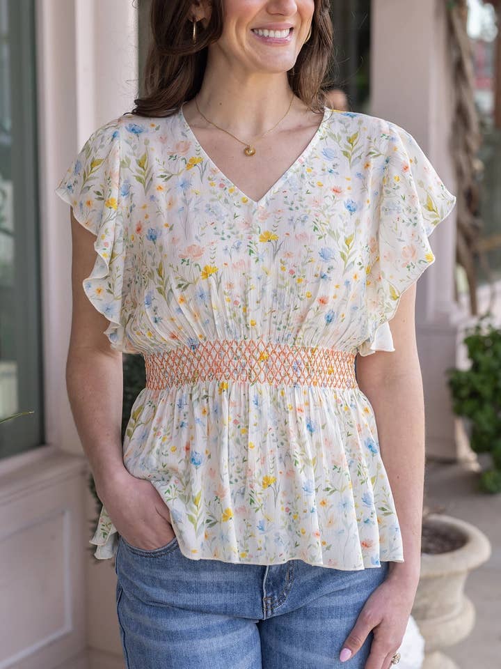 Smocked Flutter Sleeve Top in Watercolor Floral for wholesale on Faire