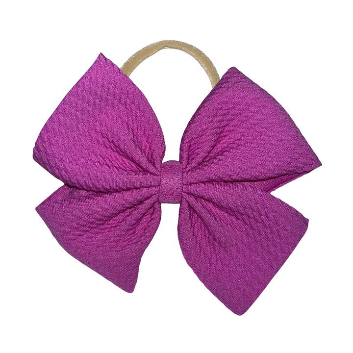 Perfect Purple Pinwheel Nylon Headband for wholesale by Happy Day Bowtique