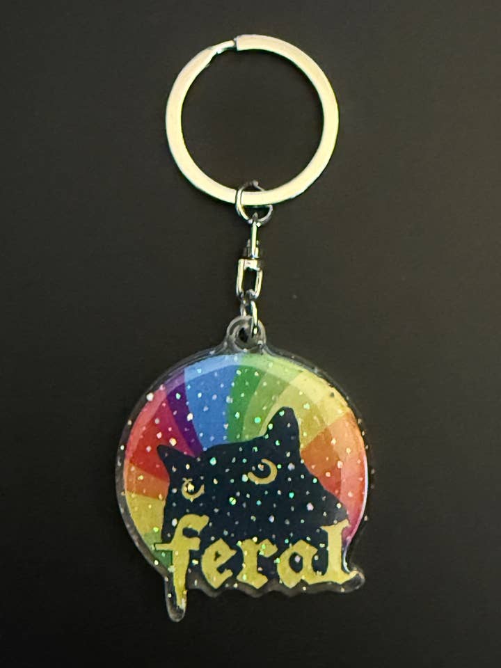 Wilder Stolz Glitzer 2" Plastikschlüsselanhänger für den Großhandel von Mobius Theory