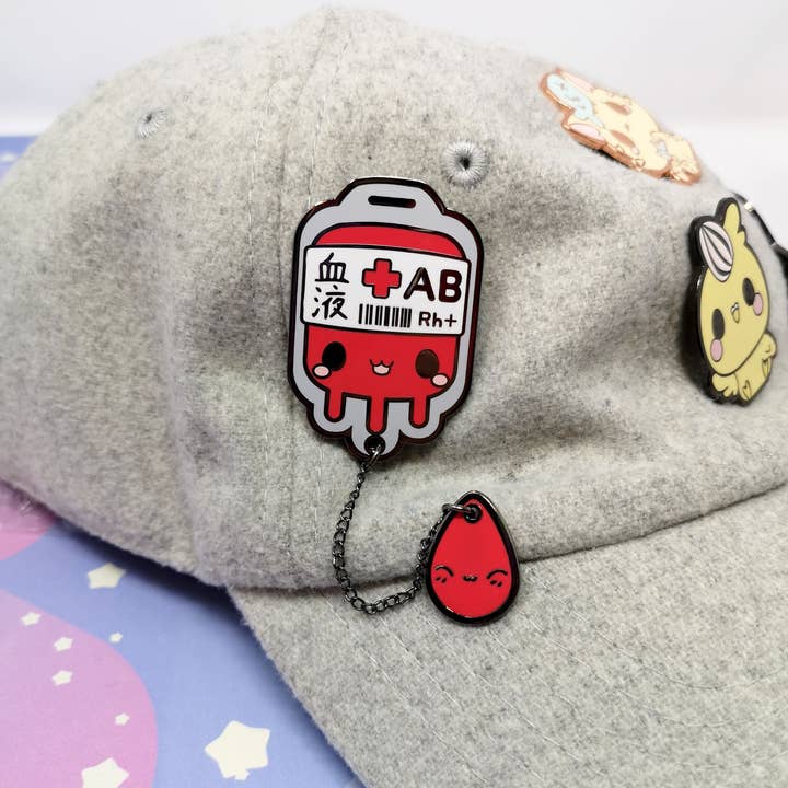 AB+ Positive Blood Bag-- Hard Enamel Collar Pin -- Kawaii Medical Pins Series for wholesale by Kittynaut