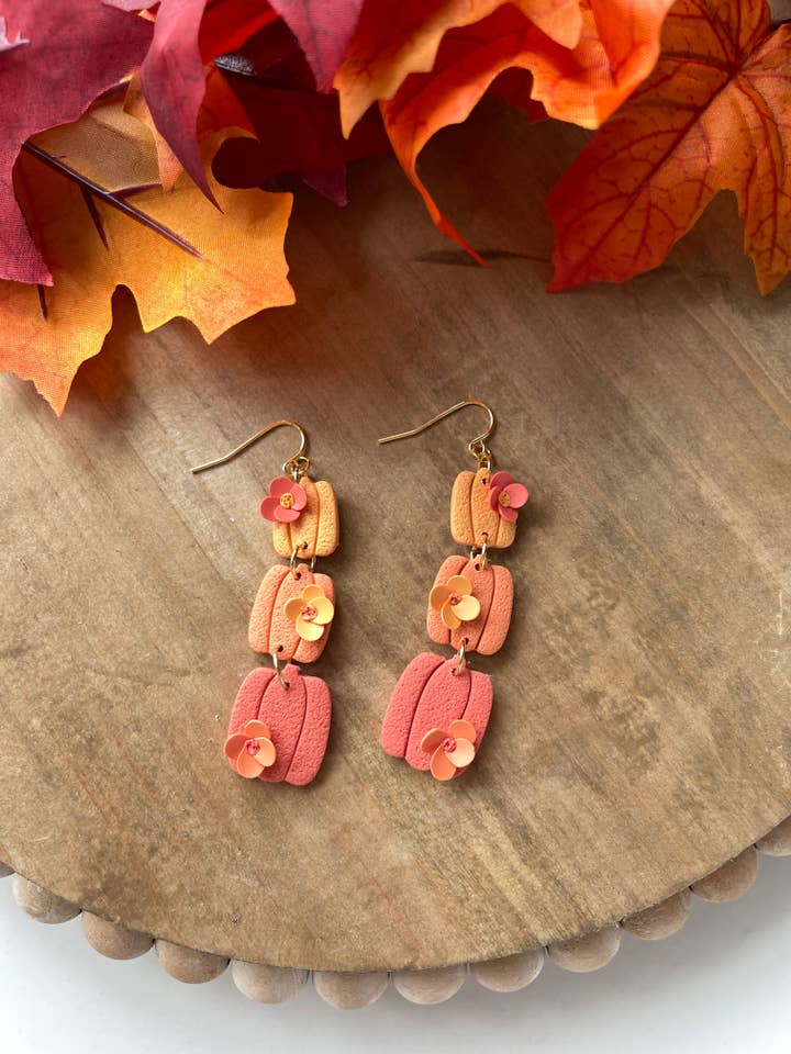 Give ‘em Pumpkin to Talk About Dangle for wholesale by Brittany Ray Designs