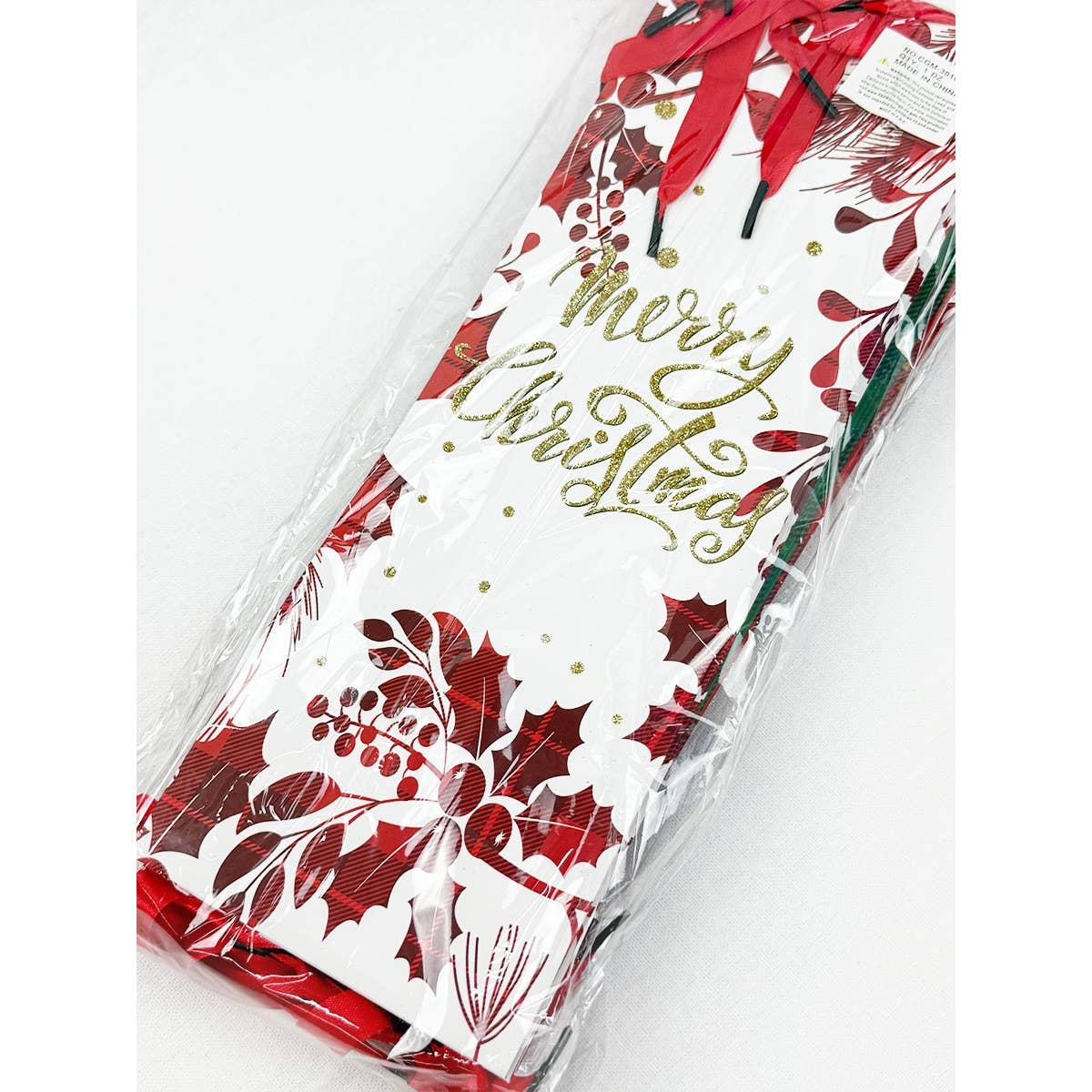 MÉLANGER LA COULEUR Sac cadeau à vin pailleté sur le thème de Noël en vente sur Faire1