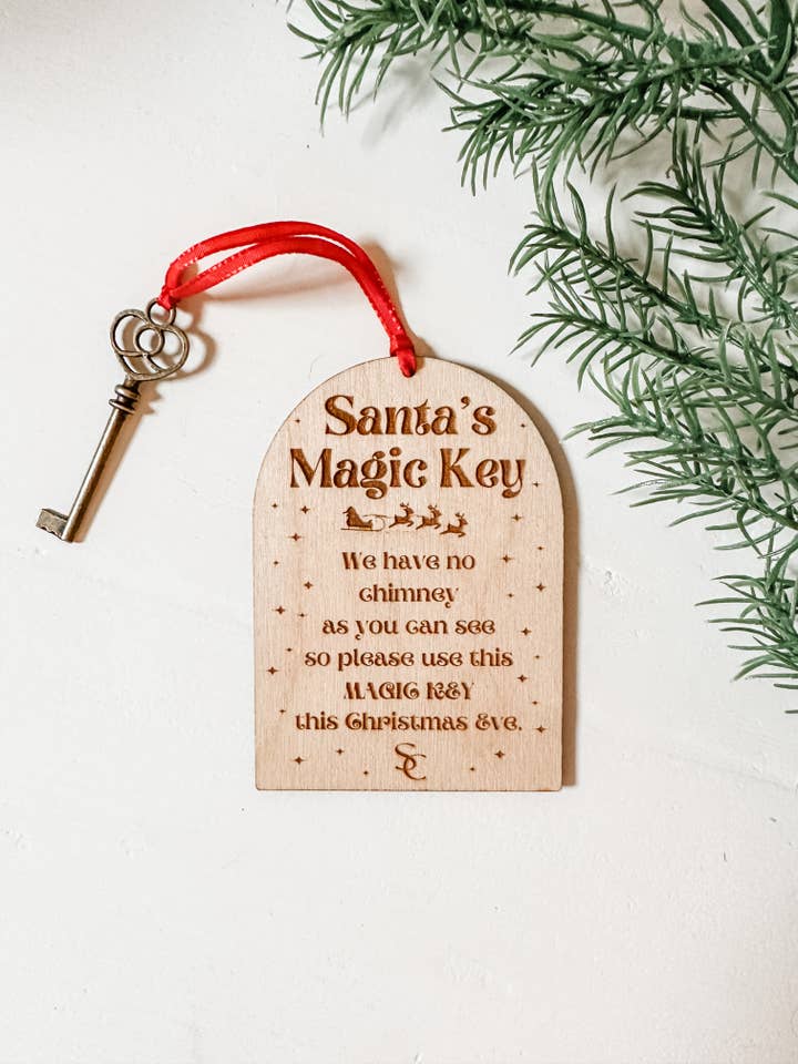 Santa's Magic Key Wooden Christmas Ornament for wholesale by Hazel + Bloom Co