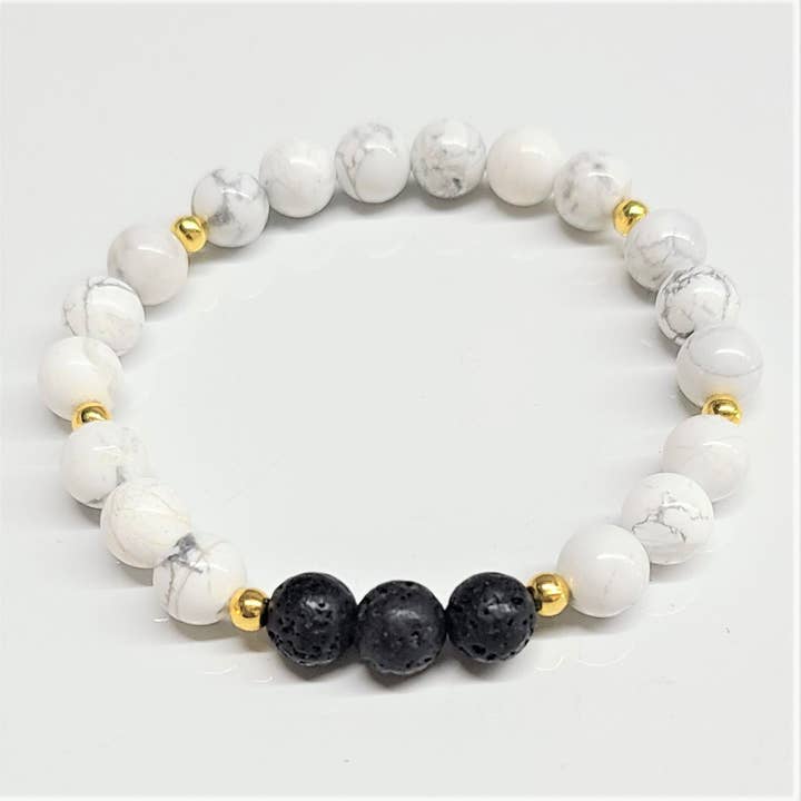 8mm Howlite/Lava Stone / Gold inserts for wholesale by Best South Gems