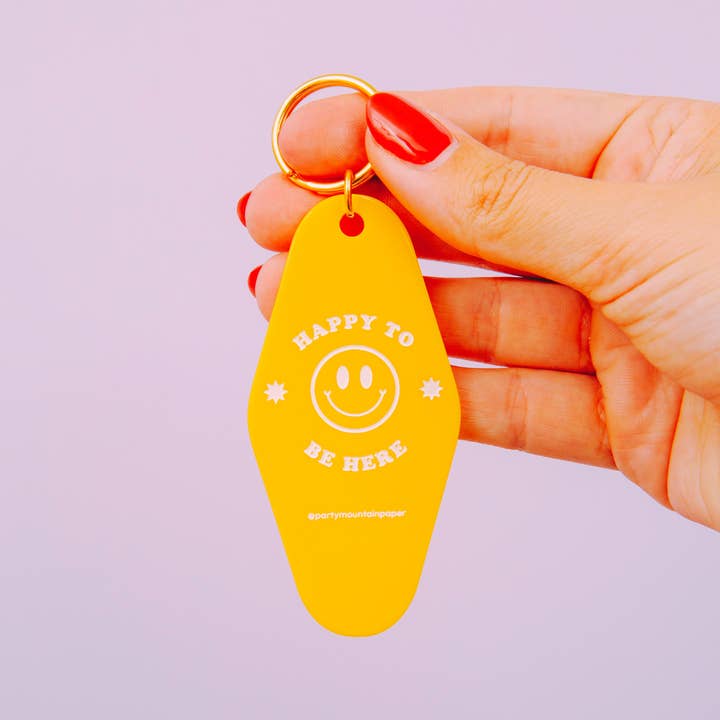 Party Mountain Paper co. - Wholesale Keychain - Unisex - Happy To Be Here Motel Tag Keychain | Last Chance