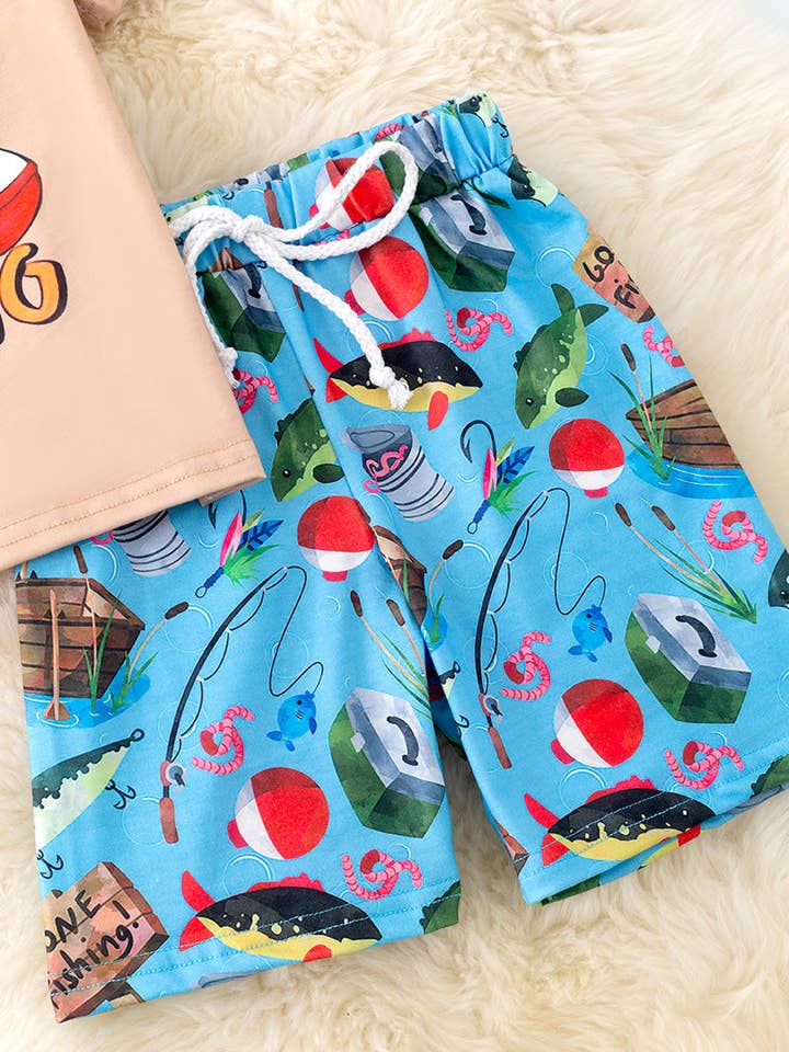 Kids Charm Online - Wholesale Top & Short Set - Kids - "I'd rather be fishing" Cream tee-shirt and blue fish printed shorts. OFB50112 SOL