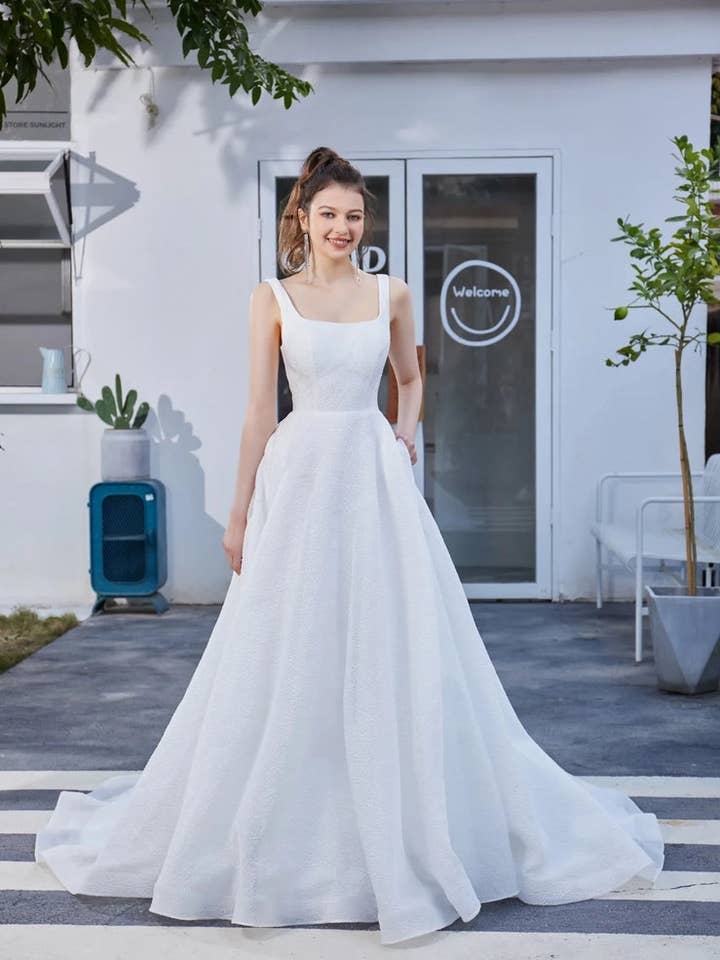 Elegant Ivory A-Line Wedding Gown JA3007 for wholesale by Tux-USA®