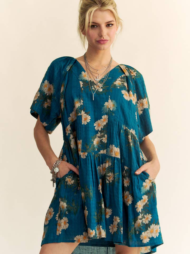 Teal Blue FLORAL PRINT SHORT BELL SLEEVE PLEATED MINI DRESS for wholesale on Faire