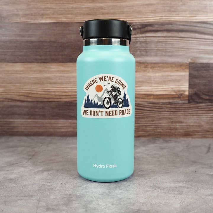 Sentinel Supply - Wholesale Sticker - Where We're Going We Don't Need Roads Mountain Bike Sticker1