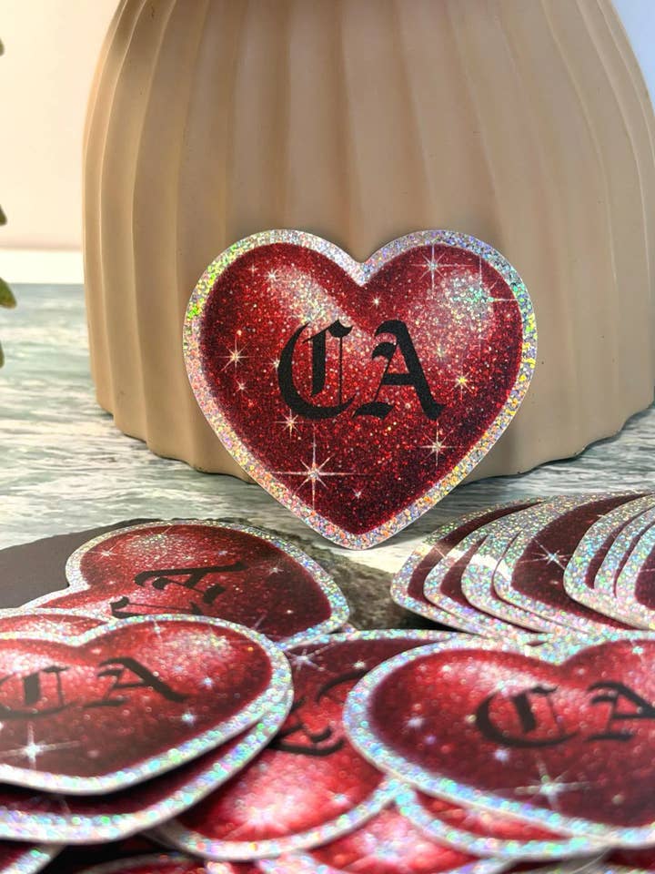 California Love- Red Glitter Heart Die Cut Sticker 2”x 1.80” for wholesale by California Dreaming Co