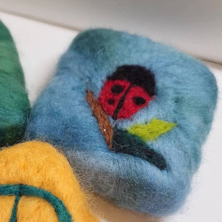 Felted soap bar - ladybug design for wholesale by Coastal Felting