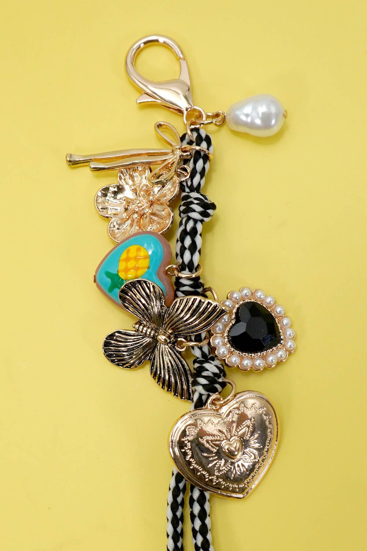 Ouro PENDENTE DE MALA-CORAÇÃO DE CORDA PORCELANA FRUTA | 80K067 para venda a revendedores na Faire2