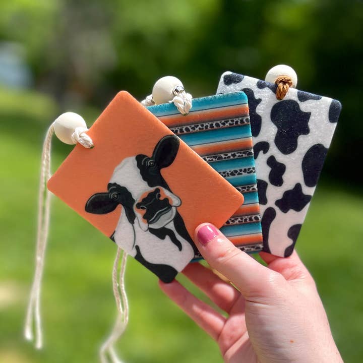 Honey Designs – wholesale Car Freshener - Women’s – Cow Print Car Charm Freshie1