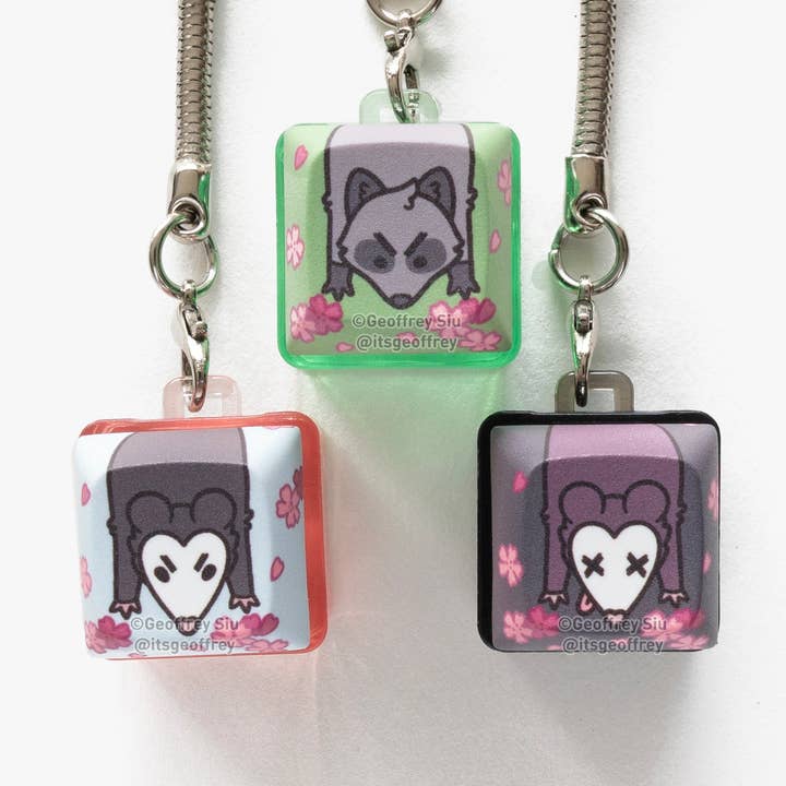 Garbage Clicky Keychains for wholesale by Geoffrey Siu Art LLC