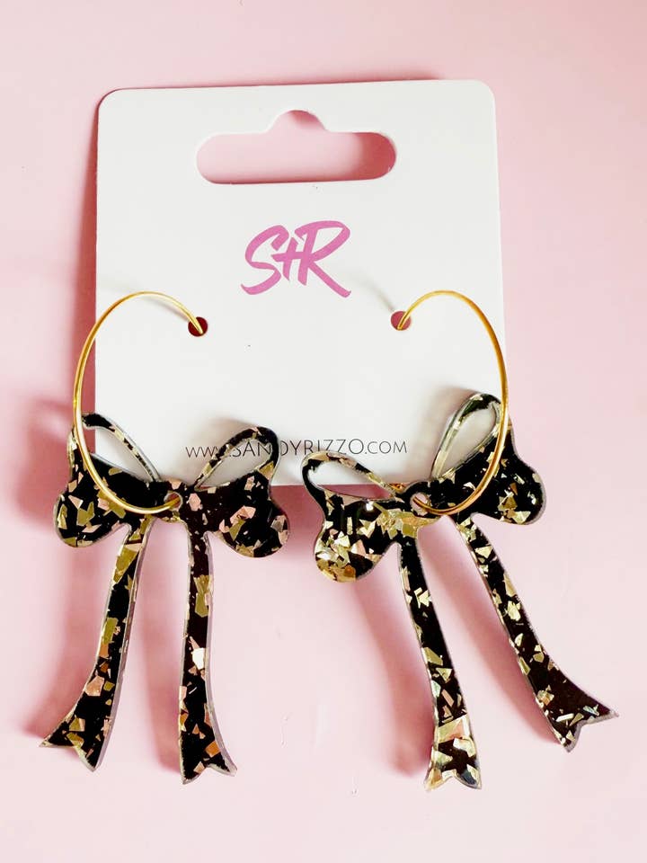 Black and Gold Confetti Acrylic Bow Hoop Earring for wholesale by Sandy + Rizzo