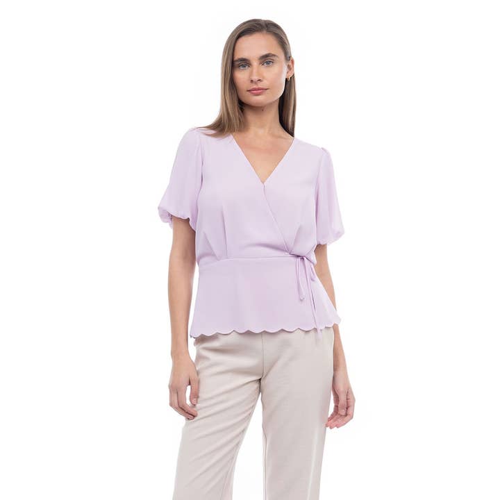 Kortärmad blus med vågig fåll för wholesale av Naked Zebra Rack