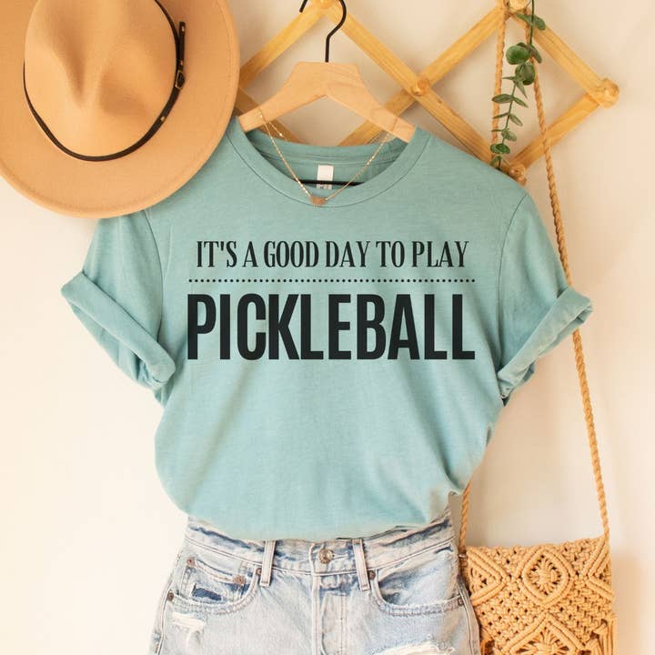 It's a Good Day to Play Pickleball Dusty Blue Tee Black Ink for wholesale by Simply Tees