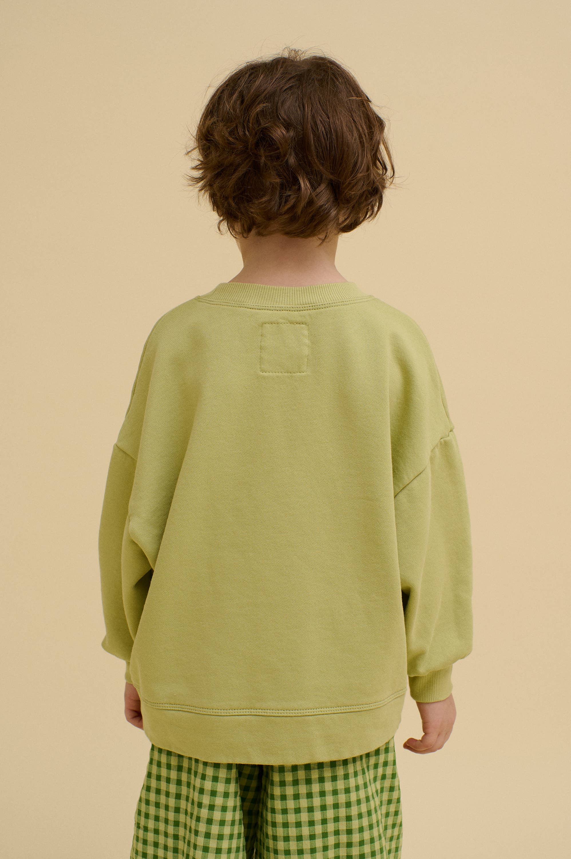 Green ORGANIC COTTON STACKED POTATO SWEATSHIRT for wholesale on Faire3