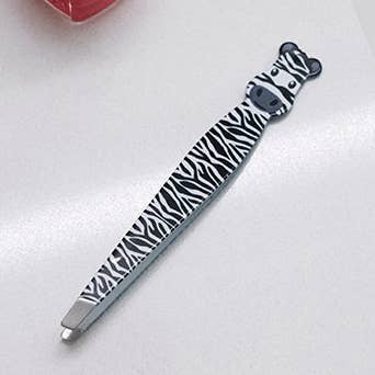 Safari Tweezers for wholesale by Kikkerland Design Inc